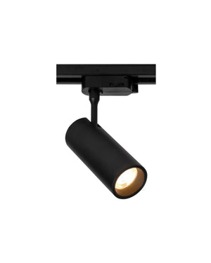 Black track light fixture illuminated on a white background