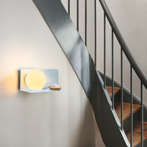 Minimalist Wall Shelf Light matte blue finish in an entrance hall