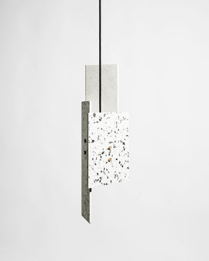 Modern pendant light with concrete finish on a white background