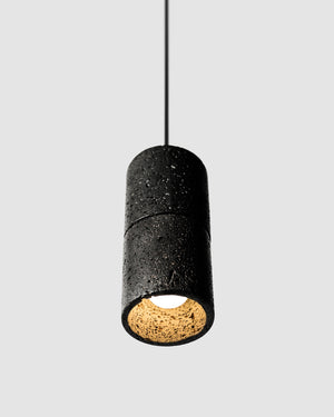 Black Ri Cylindrical Pendant Light showing the Glow