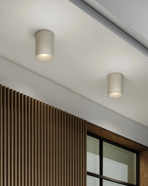 Coastal Minimalistic Round Ceiling Light Installed at the front of a modern home