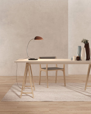 Curved Indirect Table Lamp on an office desk