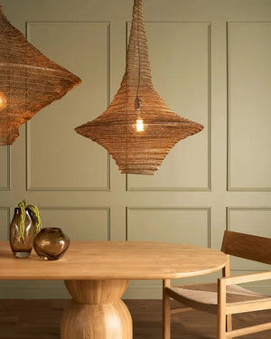 Elongated Crochet Wire Pendant Light above a dining table