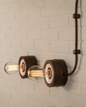 Industrial Italian Dual Wall Light on a brick wall 
