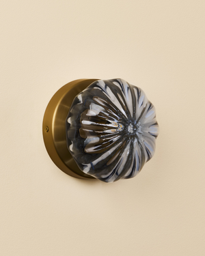 Decorative glass wall light with floral design on a brass background large size 