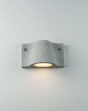 Grigio wall light fixture on a white background