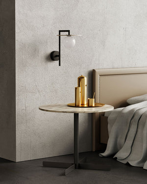 Modern bedroom with a side table and Minimalist Orb Disc Wall Light