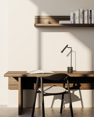 Modern home office with wooden desk, chair, and Minimalist Marble Adjustable Table Lamp