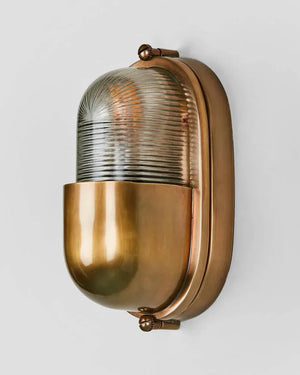 Oval Bunker Rib Glass and Brass Wall Light Brass | Lighting Collective 