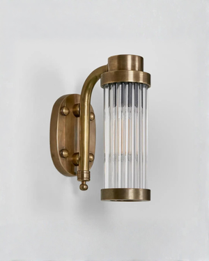 Ribbed Brass Wall Light on a plain background | Lighting Collective
