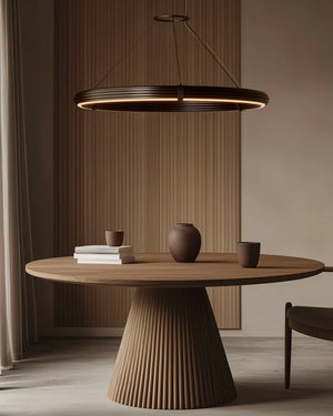 Ribbed Circular Feature Pendant hanging over a dining table