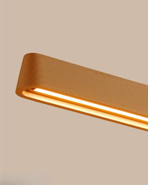 Rounded Linear Pendant with Recessed Integrated LED in Deep Warm Tan Finish