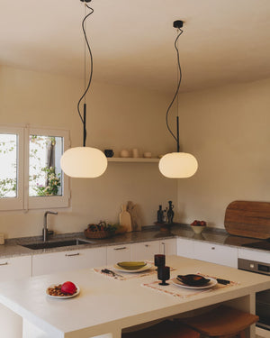 Satin Triplex Opal Glass Pendants in a Modern kitchen placed above a kitchen island | Lighting Collective 