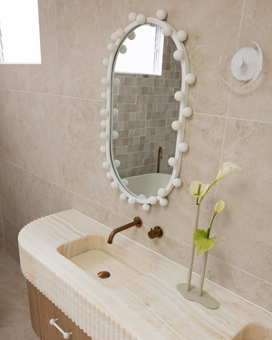 Coral Wall Light in a Bathroom