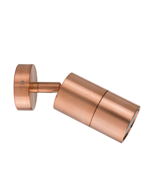 Copper wall light fixture on a white background