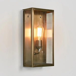 Antique Brass Encased Wall Light | Light On | Lighting Collective