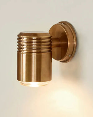 Antique Brass Ribbed Cylindrical Wall Light | Side View | Light On