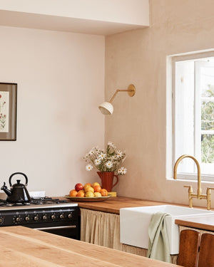 Ceramic wall light styled in a modern farmhouse kitchen