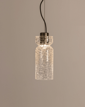 Glass crackle pendant light with textured design on a neutral background