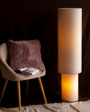 Cylindrical Linen Floor Lamp Styled in a Moody Bedroom