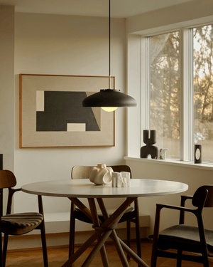 Danish Metal & Glass Pendant Light over a dining table