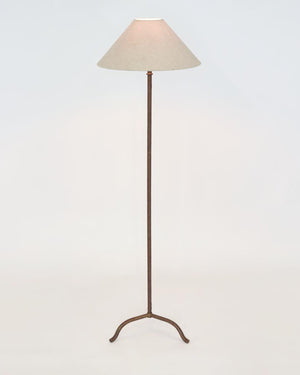 Farmhouse bronze floor lamp with warm down light in a white studio background