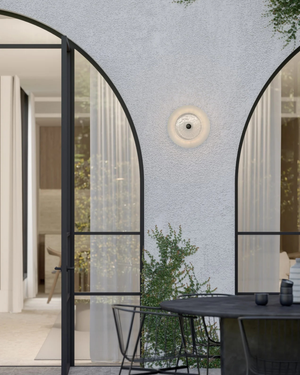 circle wall light on exterior wall 