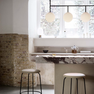 Elegant Spherical Linear Pendant | TR Bulb above a kitchen island