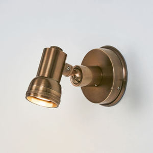 Industrial Adjustable Brass Wall Light | Lighting Collective | brass turned on