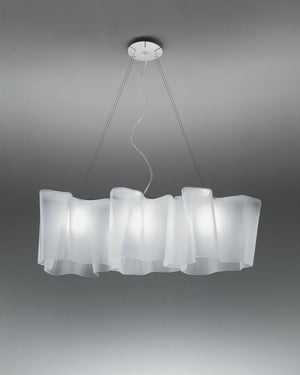 Logico 3 Linear Pendant with three sculpted frosted glass shades suspended from a ceiling canopy
