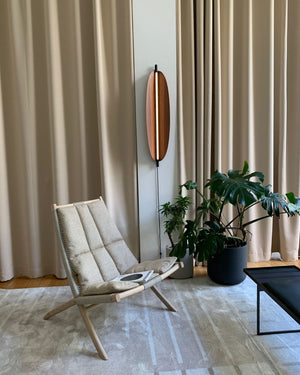 Italian Organic Leaf Wall Light Iin a reading nook