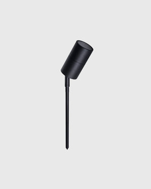 Slimline garden spike in black finish on grey background