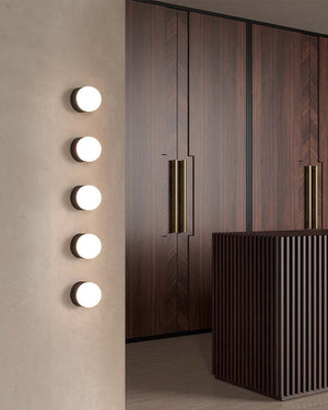 Elegant Miniature Orb Wall Light | Iron | Lighting Collective