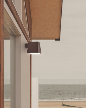 Exterior Rectangular Shade Wall Light placed on a beige wall of a coastal minimalist house