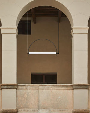 Arc pendant light that is installed in an archway