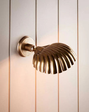 Rotatable Antique Brass Shell Wall Light | Lighting Collective