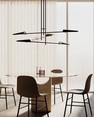 Modern Corrugated Steel Chandelier above a dining table