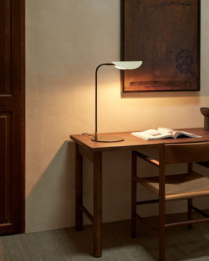 Minimalist Folded Shade Table Lamp In a Study