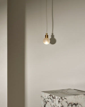 Minimalist Metal and Glass Spherical Pendant | Fabric Flex | Orb | Small | Brass | Clear Frosted | Lighting Collective