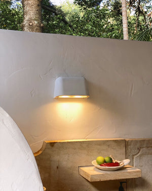 Concrete wall light styled outside