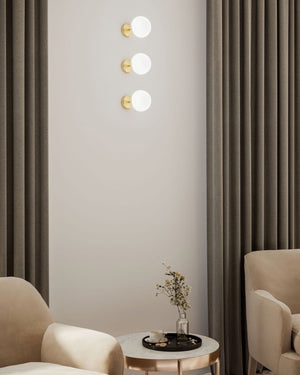 Three natural wall lights displayed in a modern reading nook