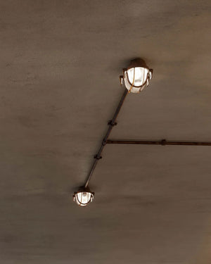Oblong Outdoor Ceiling Light displayed in a garage