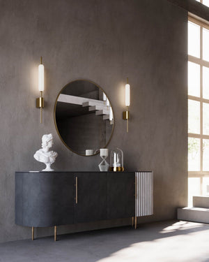 Reed Inspired Wall Lights placed on sides of a mirror in a living room
