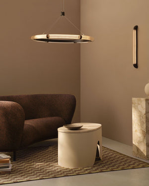 Ribbed Glass Circular Suspended Pendant suspended in a lounge room