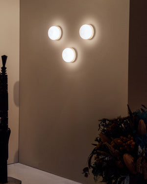 Round glass and wood ceiling or wall light | three on the wall near stairs