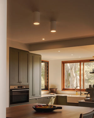 Modern kitchen with plaster downlights on ceiling