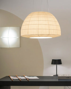 Sound Absorbing Fabric Pendant Light in warm white illuminated above a console table beside a wall sconce