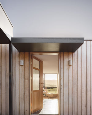 Exterior Speckled Ceramic Wall Light | Dusk Outdoor next to a front door