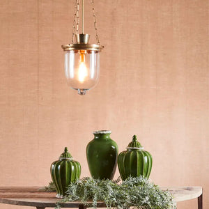 3 Chain Industrial Jar Lantern antique brass finish displayed over a table