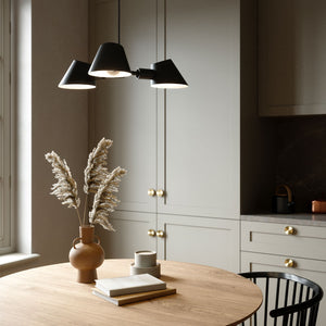 contemporary danish 3-spot pendant black finish in the kitchen